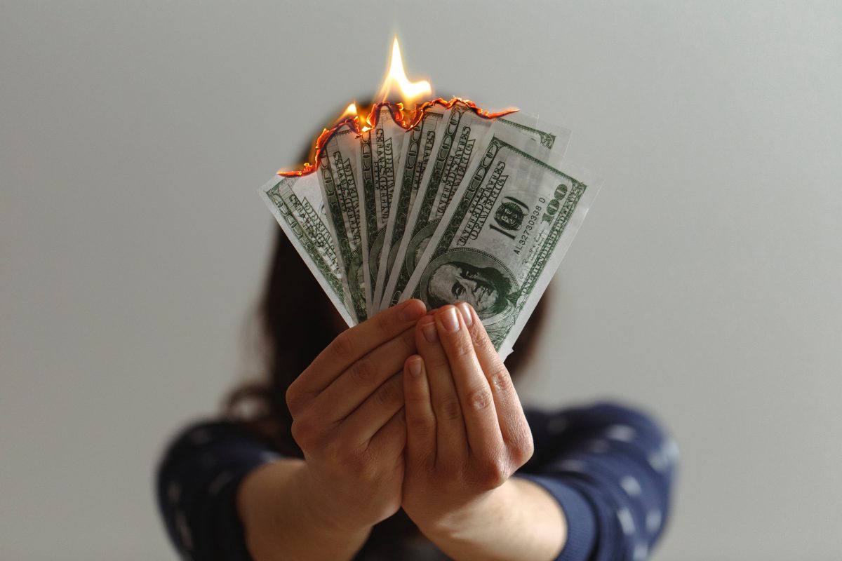 Spending, wasting, and burning money